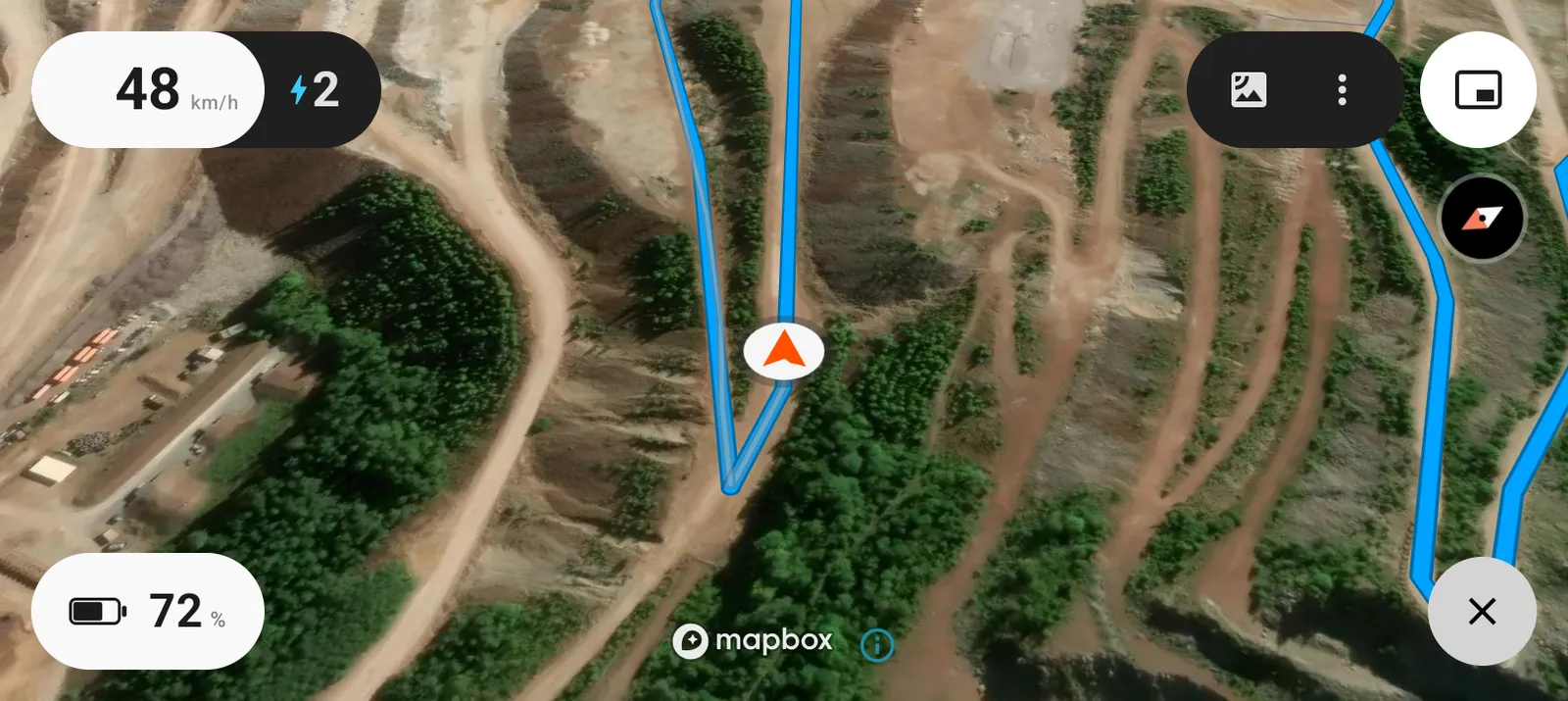 The map filling the bike screen, with the route and the rider's arrow on it
