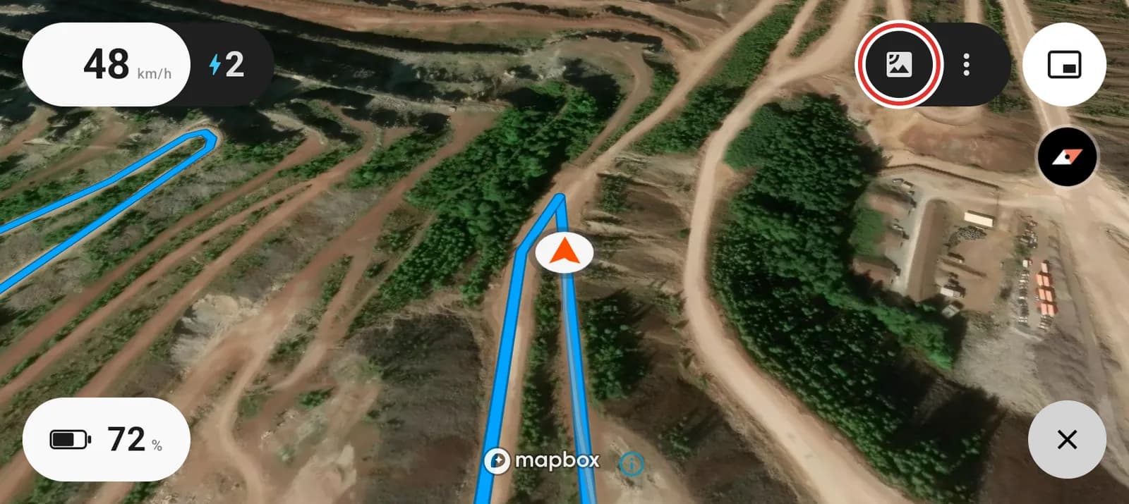 The map in satellite view, with the map view button ringed